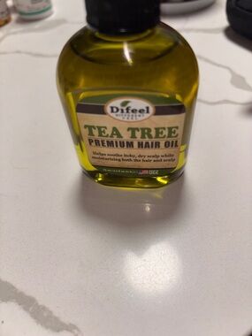Difeel Tea Tree Premium Hair Oil - Yellow Bottle